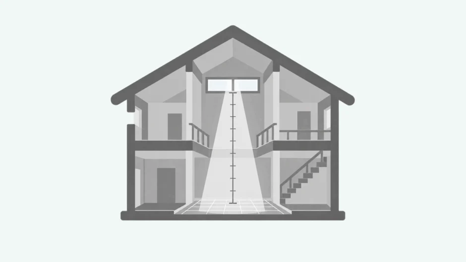 吹き抜けの断面と高窓から床へ届く光、寸法目盛りを描いた図