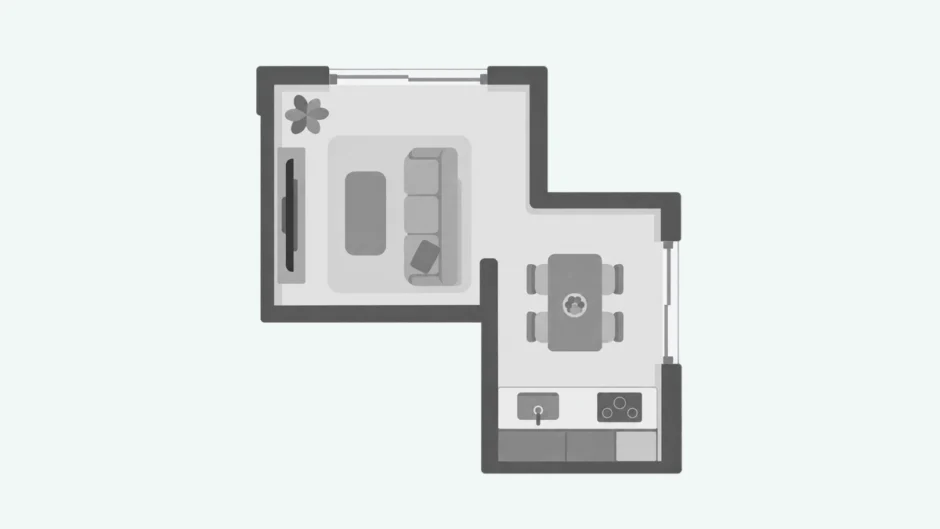 上から見たL字型LDKの平面図。ソファとテレビ、食卓とキッチンが描かれている。